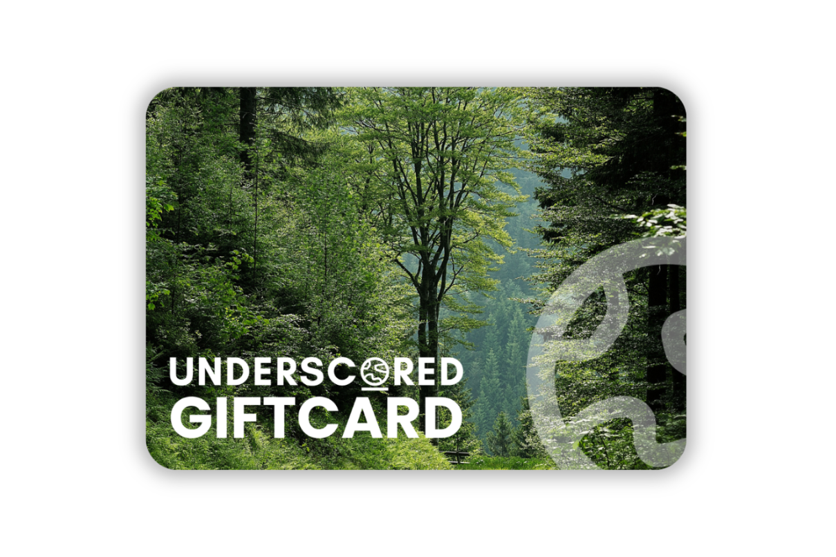 Underscored e-Gift Card with a forest design and 'Underscored' branding. Digital gift card for sustainable sportswear delivered by email.