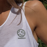 Close-up of the Underscored Women's Ashdown Tank in White showing the TENCEL Lyocell fabric texture and tonal Underscored logo, made without plastic fibres
